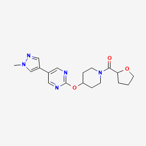 5-(1-methyl-1H-pyrazol-4-yl)-2-{[1-(oxolane-2-carbonyl)piperidin-4-yl]oxy}pyrimidine