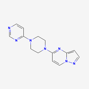 molecular formula C14H15N7 B12267911 4-(4-{Pyrazolo[1,5-a]pyrimidin-5-yl}piperazin-1-yl)pyrimidine 