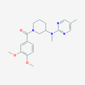 molecular formula C20H26N4O3 B12268378 N-[1-(3,4-dimethoxybenzoyl)piperidin-3-yl]-N,5-dimethylpyrimidin-2-amine 