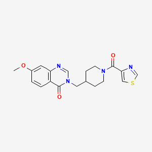 molecular formula C19H20N4O3S B12269887 7-Methoxy-3-{[1-(1,3-thiazole-4-carbonyl)piperidin-4-yl]methyl}-3,4-dihydroquinazolin-4-one 