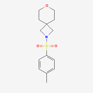 7-Oxa-2-azaspiro[3.5]nonane, 2-[(4-methylphenyl)sulfonyl]-