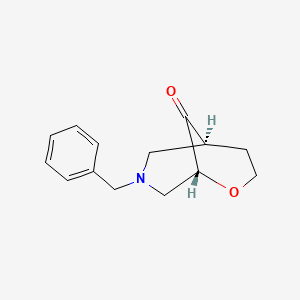 molecular formula C14H17NO2 B12279126 (1R,5S)-7-benzyl-2-oxa-7-azabicyclo[3.3.1]nonan-9-one CAS No. 1384424-48-9