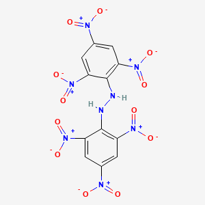 molecular formula C12H6N8O12 B1228774 Hydrazine, 1,2-bis(2,4,6-trinitrophenyl)- CAS No. 68683-32-9