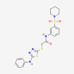 molecular formula C21H23N5O3S3 B1229386 2-[(5-anilino-1,3,4-thiadiazol-2-yl)thio]-N-[3-(1-piperidinylsulfonyl)phenyl]acetamide 