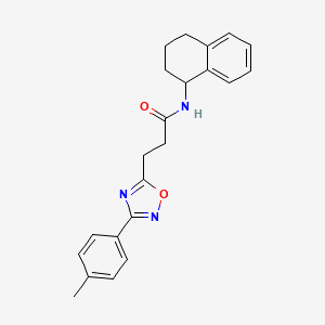 molecular formula C22H23N3O2 B1229669 3-[3-(4-methylphenyl)-1,2,4-oxadiazol-5-yl]-N-(1,2,3,4-tetrahydronaphthalen-1-yl)propanamide 