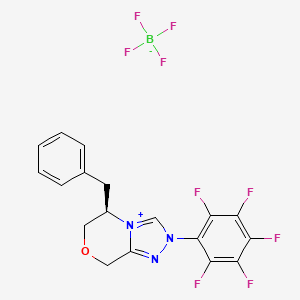 (R)-5-Benzyl-2-(perfluorophenyl)-5,6-dihydro-8H-[1,2,4]triazolo[3,4-c][1,4]oxazin-2-ium tetrafluoroborate