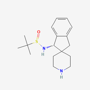 (R)-N-((S)-1,3-Dihydrospiro[indene-2,4'-piperidin]-1-yl)-2-methylpropane-2-sulfinamide