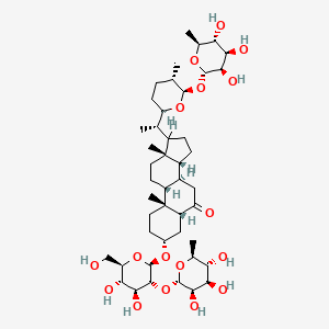 molecular formula C45H74O17 B1230463 (3R,5R,8R,9R,10R,13S,14R)-3-[(2R,3R,4S,5S,6R)-4,5-dihydroxy-6-(hydroxymethyl)-3-[(2S,3R,4R,5R,6S)-3,4,5-trihydroxy-6-methyloxan-2-yl]oxyoxan-2-yl]oxy-10,13-dimethyl-17-[(1S)-1-[(2R,5S,6R)-5-methyl-6-[(2S,3R,4R,5R,6S)-3,4,5-trihydroxy-6-methyloxan-2-yl]oxyoxan-2-yl]ethyl]-1,2,3,4,5,7,8,9,11,12,14,15,16,17-tetradecahydrocyclopenta[a]phenanthren-6-one CAS No. 33650-66-7