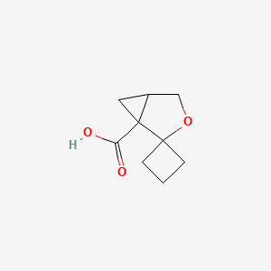 molecular formula C9H12O3 B12311261 rac-(1R,5R)-3-oxaspiro[bicyclo[3.1.0]hexane-2,1'-cyclobutane]-1-carboxylic acid, cis 