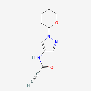 molecular formula C11H13N3O2 B12314886 N-[1-(Oxan-2-yl)-1H-pyrazol-4-yl]prop-2-ynamide 