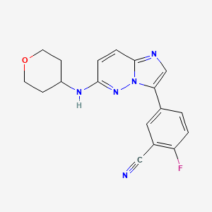 molecular formula C18H16FN5O B12315381 2-Fluoro-5-{6-[(oxan-4-yl)amino]imidazo[1,2-b]pyridazin-3-yl}benzonitrile 