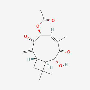molecular formula C17H22O5 B1232479 4-Acetyloxy-8-hydroxy-2-methylene-6,10,10-trimethyl-bicyclo(7.2.0)undec-5-ene-3,7-dione CAS No. 92121-62-5
