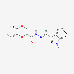 molecular formula C19H17N3O3 B1232585 N-[(E)-(1-methylindol-3-yl)methylideneamino]-2,3-dihydro-1,4-benzodioxine-3-carboxamide 
