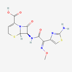 molecular formula C13H13N5O5S2 B1233001 7-[2-(2-Amino-thiazol-4-yl)-2-methoxyimino-acetylamino]-8-oxo-5-thia-1-aza-bicyclo[4.2.0]oct-2-ene-2-carboxylic acid 