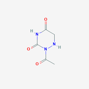 molecular formula C5H7N3O3 B12332214 2-Acetyl-1,2,4-triazinane-3,5-dione 