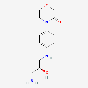 4-[4-[[(2S)-3-amino-2-hydroxypropyl]amino]phenyl]morpholin-3-one