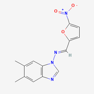molecular formula C14H12N4O3 B1233825 5,6-dimethyl-N-[(5-nitro-2-furyl)methylene]-1H-benzimidazol-1-amine 