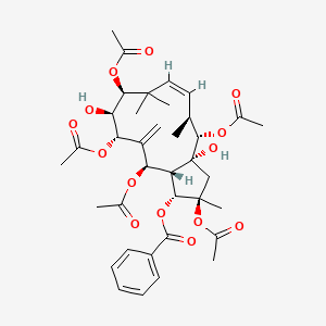 molecular formula C37H48O14 B12339183 [(1R,2R,3aR,4S,5S,6Z,9S,10S,11S,13R,13aS)-2,4,9,11,13-pentaacetyloxy-3a,10-dihydroxy-2,5,8,8-tetramethyl-12-methylidene-3,4,5,9,10,11,13,13a-octahydro-1H-cyclopenta[12]annulen-1-yl] benzoate 