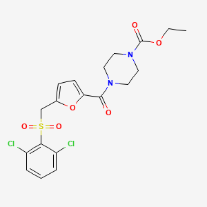 molecular formula C19H20Cl2N2O6S B1234115 4-[[5-[(2,6-Dichlorophenyl)sulfonylmethyl]-2-furanyl]-oxomethyl]-1-piperazinecarboxylic acid ethyl ester 