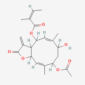 molecular formula C22H28O7 B1234154 [(5Z,10Z)-9-acetyloxy-7-hydroxy-6,10-dimethyl-3-methylidene-2-oxo-3a,4,7,8,9,11a-hexahydrocyclodeca[b]furan-4-yl] (Z)-2-methylbut-2-enoate CAS No. 33854-15-8