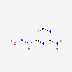 molecular formula C5H6N4O B12343958 4-[(Hydroxyimino)methyl]pyrimidin-2-amine 