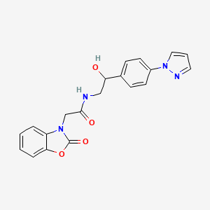 molecular formula C20H18N4O4 B12345093 N-{2-hydroxy-2-[4-(1H-pyrazol-1-yl)phenyl]ethyl}-2-(2-oxo-2,3-dihydro-1,3-benzoxazol-3-yl)acetamide 