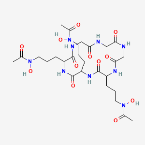 molecular formula C27H45N9O12 B1234748 N-[3-[5,8-bis[3-[acetyl(hydroxy)amino]propyl]-3,6,9,12,15,18-hexaoxo-1,4,7,10,13,16-hexazacyclooctadec-2-yl]propyl]-N-hydroxyacetamide CAS No. 15630-64-5