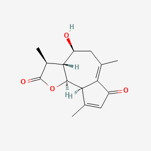 molecular formula C15H18O4 B1234837 (3S,3aR,4S,9aR,9bR)-4-hydroxy-3,6,9-trimethyl-3,3a,4,5,9a,9b-hexahydroazuleno[4,5-b]furan-2,7-dione 