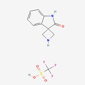 molecular formula C11H11F3N2O4S B12348578 Spiro[azetidine-3,3'-indolin]-2'-one trifluoromethanesulfonate 