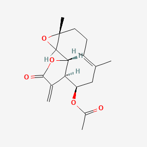 molecular formula C17H22O5 B1236140 [(1S,4R,7E,10R,11R)-4,8-dimethyl-12-methylidene-13-oxo-3,14-dioxatricyclo[9.3.0.02,4]tetradec-7-en-10-yl] acetate 