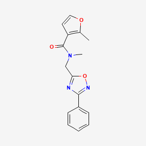 molecular formula C16H15N3O3 B1237335 N,2-dimethyl-N-[(3-phenyl-1,2,4-oxadiazol-5-yl)methyl]furan-3-carboxamide 