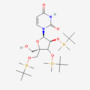 1-[(2R,3S,5R)-3,4-bis[[tert-butyl(dimethyl)silyl]oxy]-5-[[tert-butyl(dimethyl)silyl]oxymethyl]-5-(hydroxymethyl)oxolan-2-yl]pyrimidine-2,4-dione