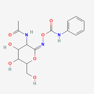 molecular formula C15H19N3O7 B1239690 [(E)-[3-acetamido-4,5-dihydroxy-6-(hydroxymethyl)oxan-2-ylidene]amino] N-phenylcarbamate 