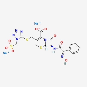 molecular formula C18H15N7Na2O8S3 B1240872 Disodium;(6R,7R)-7-[[(2E)-2-hydroxyimino-2-phenylacetyl]amino]-8-oxo-3-[[1-(sulfonatomethyl)tetrazol-5-yl]sulfanylmethyl]-5-thia-1-azabicyclo[4.2.0]oct-2-ene-2-carboxylate CAS No. 66242-83-9