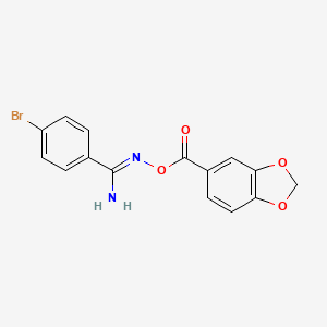 molecular formula C15H11BrN2O4 B1241167 N'-[(1,3-benzodioxol-5-ylcarbonyl)oxy]-4-bromobenzenecarboximidamide 