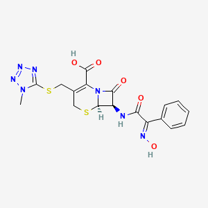 molecular formula C18H17N7O5S2 B1245351 (6R,7R)-7-[[(2E)-2-hydroxyimino-2-phenylacetyl]amino]-3-[(1-methyltetrazol-5-yl)sulfanylmethyl]-8-oxo-5-thia-1-azabicyclo[4.2.0]oct-2-ene-2-carboxylic acid CAS No. 61606-60-8