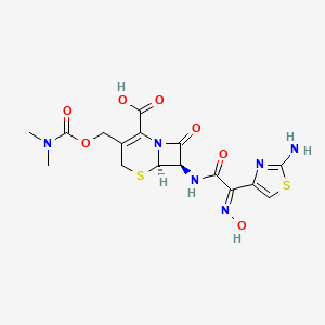 molecular formula C16H18N6O7S2 B1249495 (6R,7R)-7-[[(2E)-2-(2-Amino-1,3-thiazol-4-yl)-2-hydroxyiminoacetyl]amino]-3-(dimethylcarbamoyloxymethyl)-8-oxo-5-thia-1-azabicyclo[4.2.0]oct-2-ene-2-carboxylic acid CAS No. 152846-27-0