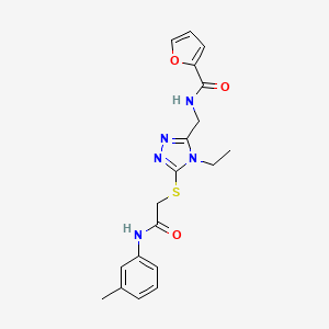 molecular formula C19H21N5O3S B12502532 N-{[4-ethyl-5-({2-[(3-methylphenyl)amino]-2-oxoethyl}sulfanyl)-4H-1,2,4-triazol-3-yl]methyl}furan-2-carboxamide 