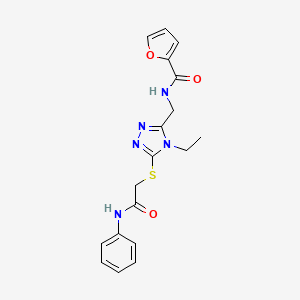 N-[(4-ethyl-5-{[2-oxo-2-(phenylamino)ethyl]sulfanyl}-4H-1,2,4-triazol-3-yl)methyl]furan-2-carboxamide