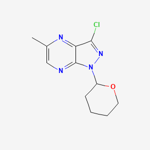 3-Chloro-5-methyl-1-(tetrahydro-2H-pyran-2-yl)-1H-pyrazolo[3,4-b]pyrazine