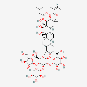 molecular formula C62H96O27 B1251243 (2S,3S,4S,5R,6R)-6-[[(3S,4aR,6aR,6bS,7R,8S,8aR,9R,10R,12aS,14aR,14bR)-7,8-二羟基-8a-(羟甲基)-4,4,6a,6b,11,11,14b-七甲基-10-[(Z)-2-甲基丁-2-烯酰]氧基-9-(3-甲基丁-2-烯酰氧基)-1,2,3,4a,5,6,7,8,9,10,12,12a,14,14a-十四氢芘-3-基]氧基]-3-[(2S,3R,4R,5S)-3,4-二羟基-5-(羟甲基)噁烷-2-基]氧基-5-[(2S,3R,4S,5S,6R)-3,4,5-三羟基-6-(羟甲基)氧杂环己烷-2-基]氧基-4-[(2R,3S,4R,5R)-3,4,5-三羟基氧杂环己烷-2-基]氧代氧杂环戊烷-2-羧酸 