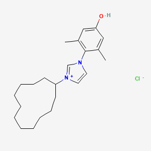 molecular formula C23H35ClN2O B12514858 1-Cyclododecyl-3-(4-hydroxy-2,6-dimethylphenyl)-1H-imidazol-3-ium chloride 