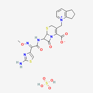 molecular formula C22H24N6O9S3 B1252113 7-[[(2E)-2-(2-amino-1,3-thiazol-4-yl)-2-methoxyiminoacetyl]amino]-3-(6,7-dihydro-5H-cyclopenta[b]pyridin-1-ium-1-ylmethyl)-8-oxo-5-thia-1-azabicyclo[4.2.0]oct-2-ene-2-carboxylate;sulfuric acid 