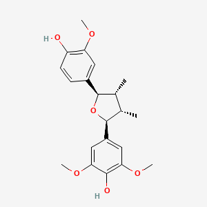 molecular formula C21H26O6 B1253139 4-[(2S,3S,4R,5R)-5-(4-羟基-3-甲氧基苯基)-3,4-二甲氧基氧杂环-2-基]-2,6-二甲氧基苯酚 