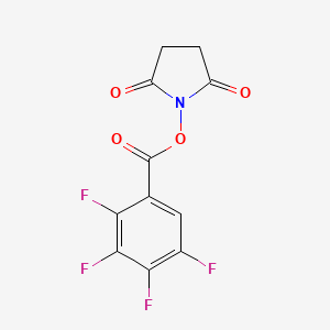 1-[(2,3,4,5-Tetrafluorobenzoyl)oxy]pyrrolidine-2,5-dione