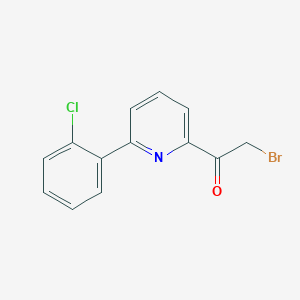 2-Bromo-1-[6-(2-chlorophenyl)pyridin-2-yl]ethan-1-one