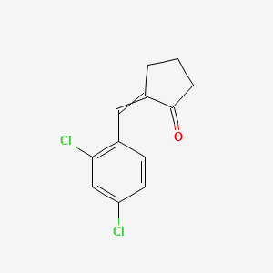 2-[(2,4-Dichlorophenyl)methylidene]cyclopentan-1-one