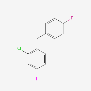 2-Chloro-1-[(4-fluorophenyl)methyl]-4-iodobenzene