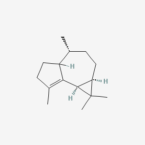 molecular formula C15H24 B1258743 (1aR,4R,7bS)-1,1,4,7-tetramethyl-1a,2,3,4,4a,5,6,7b-octahydrocyclopropa[e]azulene CAS No. 489-40-7