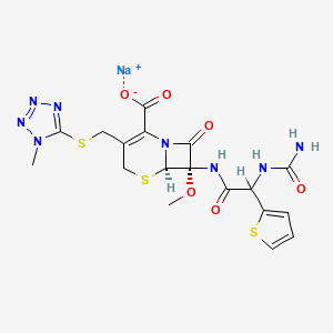 molecular formula C18H19N8NaO6S3 B1261171 sodium;(6R,7S)-7-[[2-(carbamoylamino)-2-thiophen-2-ylacetyl]amino]-7-methoxy-3-[(1-methyltetrazol-5-yl)sulfanylmethyl]-8-oxo-5-thia-1-azabicyclo[4.2.0]oct-2-ene-2-carboxylate CAS No. 67780-08-9